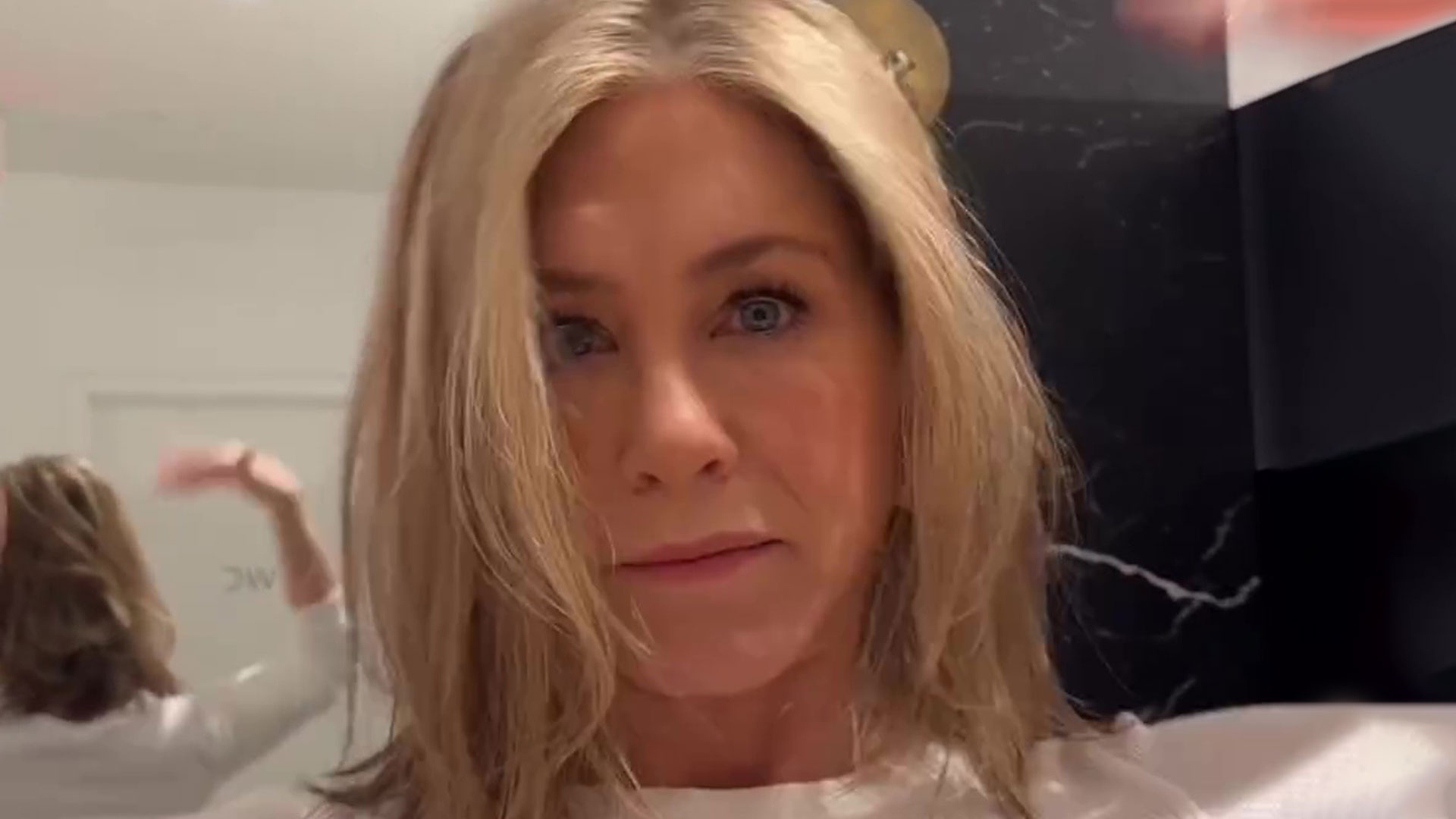 Jennifer Aniston puts on very perky display in a white top for new ad as fans joke ‘I can only concentrate on one thing’ [Video]
