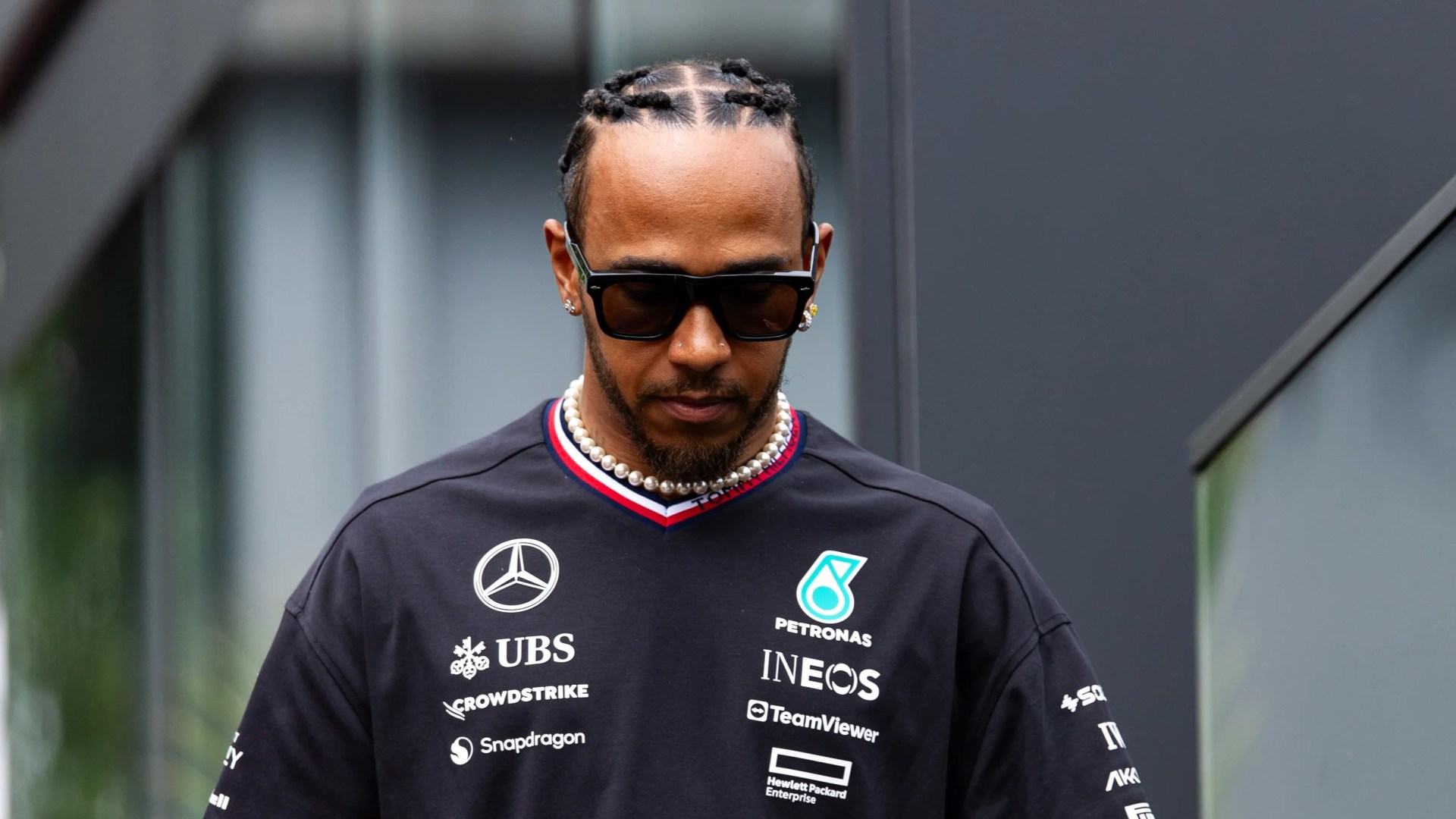 Lewis Hamilton grimaces as he ‘eats a DOG biscuit’ in NFL schedule release video for team F1 star part owns