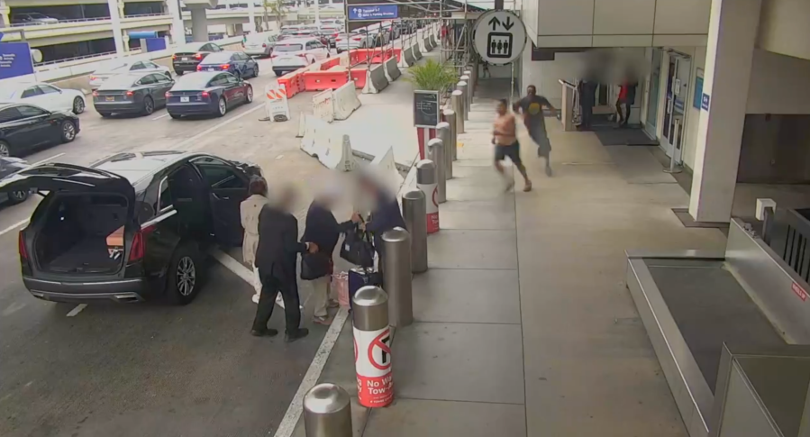 Violent road-rage fight at L.A. airport leaves elderly woman unconscious [Video]