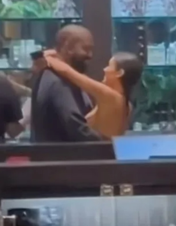 Bianca Censori Avoids Wardrobe Malfunction as She Goes Nearly Topless While Wrapping Hands Around Husband Kanye West in Tokyo [Video]